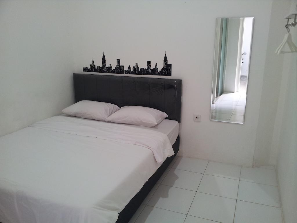 Loxy Inn Surabaya Cameră foto