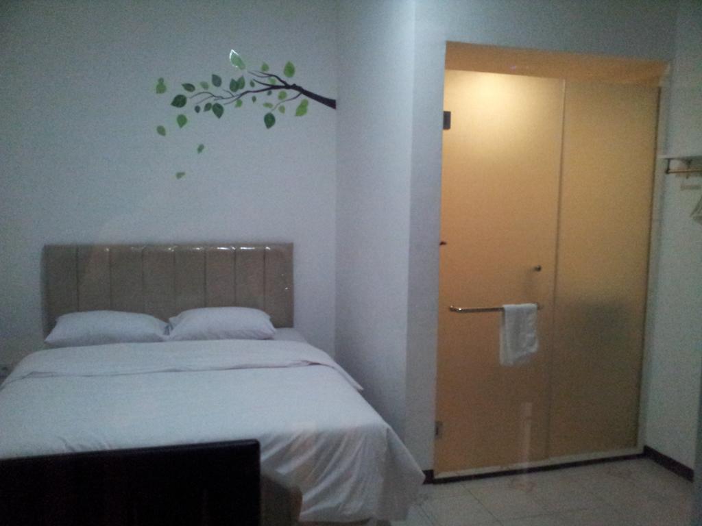 Loxy Inn Surabaya Cameră foto