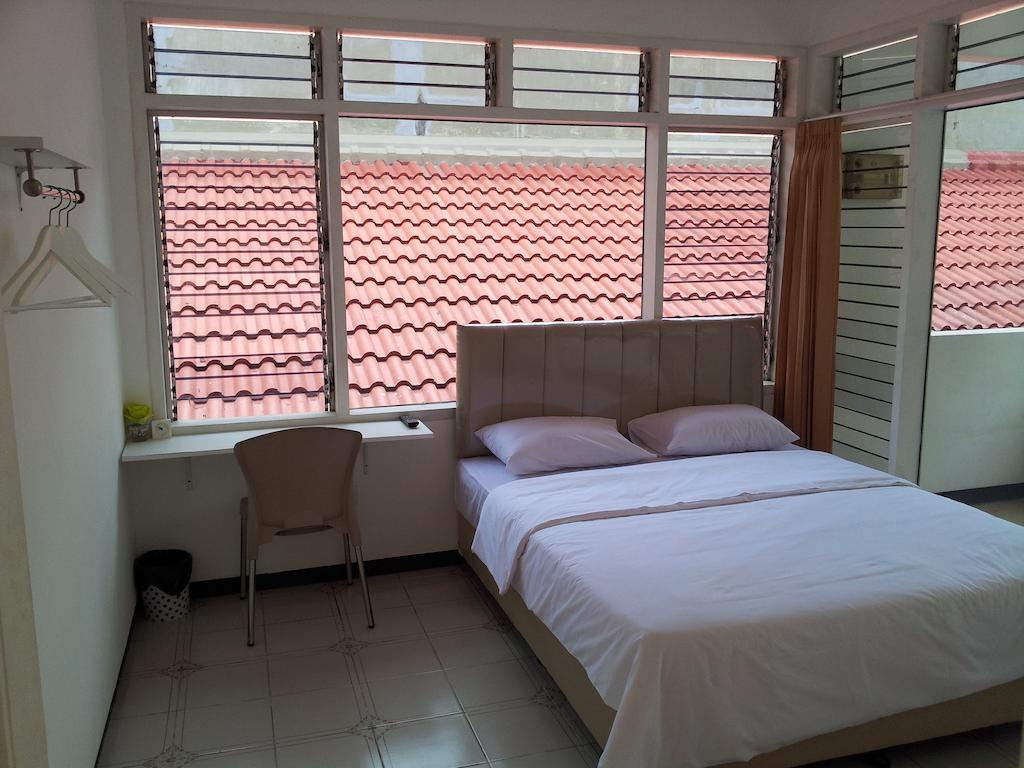 Loxy Inn Surabaya Cameră foto