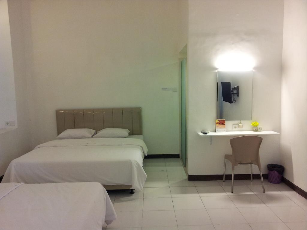 Loxy Inn Surabaya Cameră foto